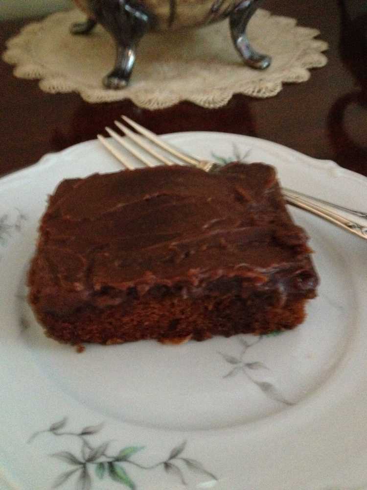 Moist and fudgy chocolate glazed chocolate sheet cake